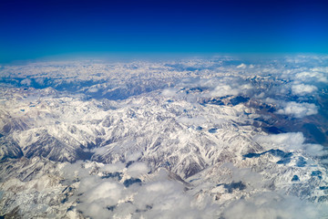 Beautiful winter with snow mountains and blue sky.