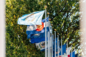 Washington DC, USA Union Station with closeup of row of state American flags on street framing...