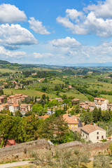 Fototapeta na wymiar Aerial view of the city of San Gimignano with a rural landscape in Tuscany