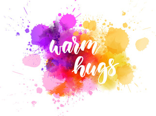 Warm hugs lettering on watercolor splash