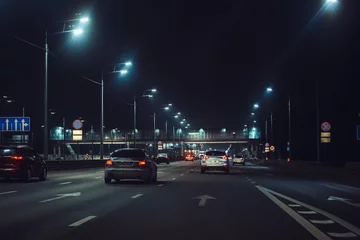 Stof per meter Urban city traffic cars in night illuminated asphalt city road, abstract cityscape transportation concept © DedMityay