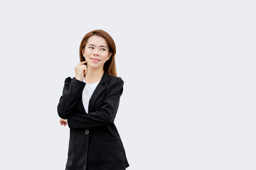 asian business woman thinking and smile with long hair in black suit isolated on white color background