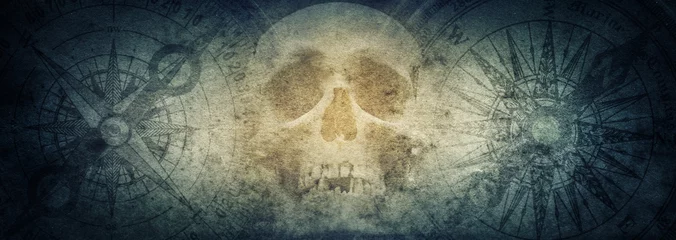 Photo sur Plexiglas Pour lui Crâne de pirate et boussoles sur fond de papier grunge ancien.