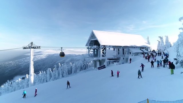 Aerial view over the tourists on ski slope, ski resort with gondola, landscape panorama, Poland - Europe
