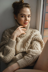 young woman in sweater