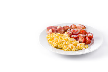 Breakfast with scrambled eggs, bacon and tomatoes isolated on white background. Copyspace