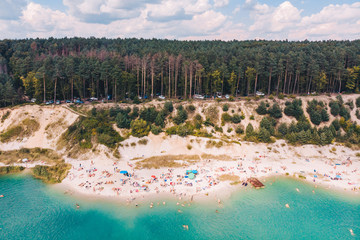 aerial view of lake shore in sunny day.