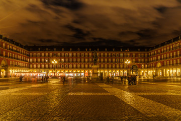 Fototapeta na wymiar After the sunset, the Main Square of Madrid reveals its great color