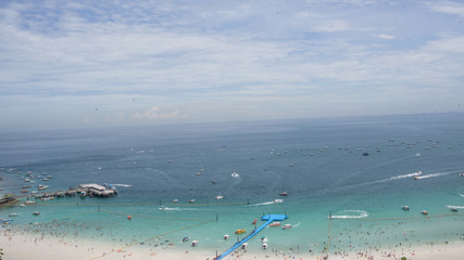 Fototapeta na wymiar Sea view tropical beach with sunny sky on TAWAN baach of KHOALAN island,PATTAYA THAILAND.