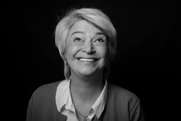 Portrait of a mature woman doing facial expressions