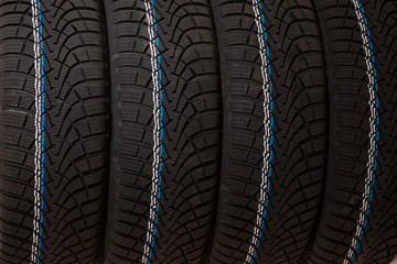 New winter tires isolated over white