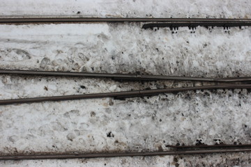 snow-covered railway tracks. winter outside. swept arrows needed cleaning. traffic jams, the subway can't get through.