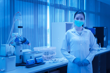 Asian scientist working in the lab,Doing experiment for product,The researchers analyzed to find the results of the experiment.