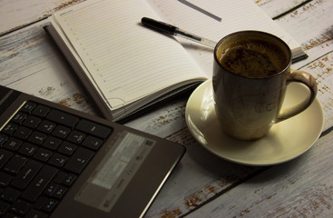 Morning notebook diary and coffee