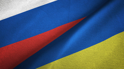 Russia and Ukraine two flags textile cloth, fabric texture