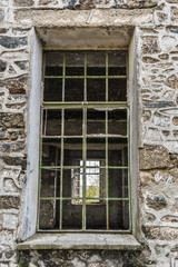 Window in Berengaria abandoned hotel in mountain region of Trodos, Cyprus
