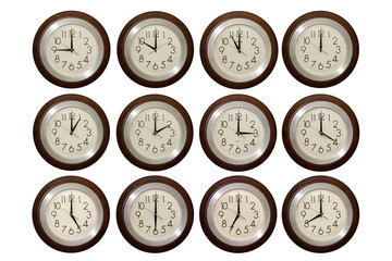 Wall clock isolated on the white background. Multiple clocks showing different time.
