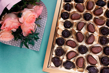 Gift beloved, sweets, flowers, coffee. Romantic breakfast. Surprise for beloved.