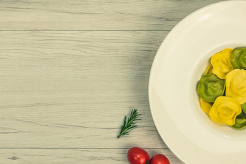 Cassic ravioli filled with basilico and cheese in a plate.