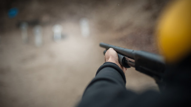Combat shotgun shooting training. Long gun, pump gun and scattergun