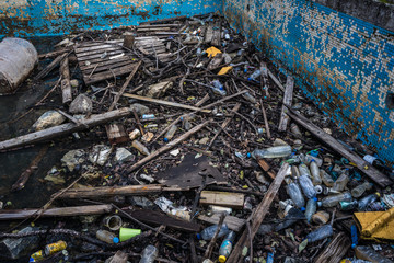 Polluted with plastic swimming pool of Berengaria abandoned hotel in mountain region of Trodos, Cyprus