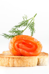 canapes with salmon on toast with greens