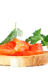 canapes with salmon on toast with greens