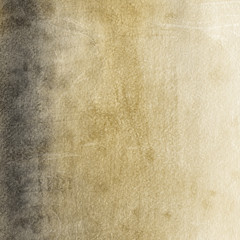 Gold luxury ink and watercolor textures on white paper background. Paint leaks and ombre effects. Hand painted abstract image.