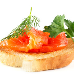 canapes with salmon on toast with greens