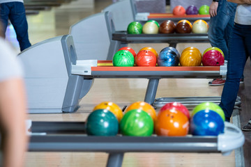 Fototapeta na wymiar Bowling balls; people playing bowling