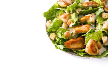 Caesar salad with lettuce,chicken and croutons isolated on white background. Copyspace