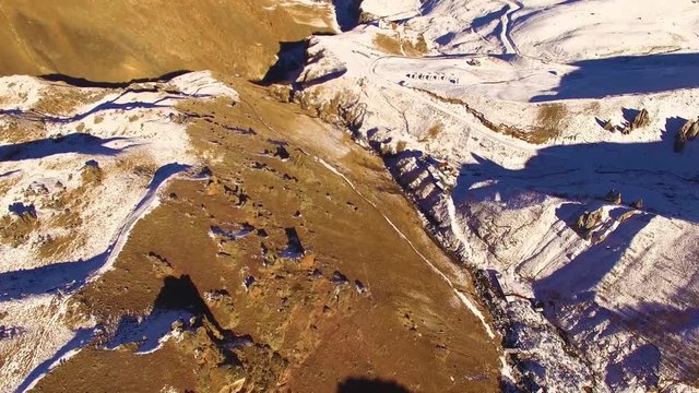 Flight over mountains, the beautiful top view on hillsides, the nature of the North Caucasus