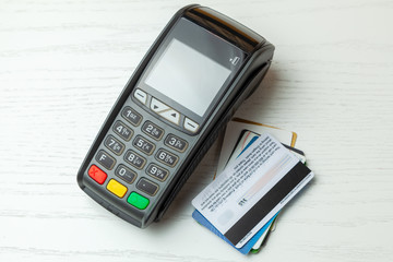 POS terminal, Payment Machine with credit card isolated on white background. Contactless payment with NFC technology.