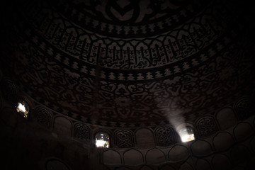 Decorating, engraving and drawing on the roofs of ancient mosques in Egypt