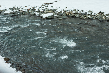 Obraz premium Mountain river water landscape. Wild river in mountains. Mountain wild river water view 