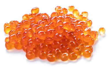 Red caviar on white background. Top view. Macro picture.