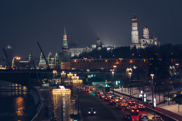 Fototapeta na wymiar Moscow Kremlin. Night scene. The Moscow river embankment. The bridge over the river