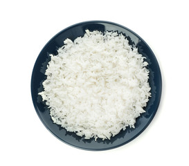 Plate of boiled rice on white background, top view