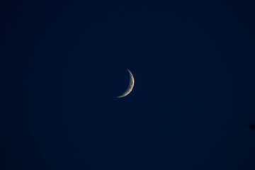 Obraz na płótnie Canvas Part/Half moon in Dark Blue Night Sky with lots of space