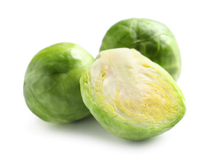 Fresh tasty Brussels sprouts on white background