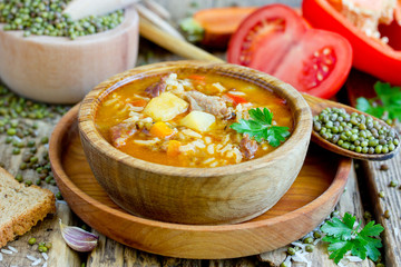 Mashhurda - traditional uzbek meat soup with rice, mung beans and vegetables