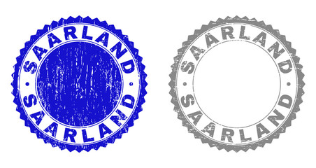 Grunge SAARLAND stamp seals isolated on a white background. Rosette seals with distress texture in blue and grey colors. Vector rubber stamp imitation of SAARLAND title inside round rosette.