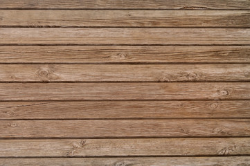 Old dark brown wooden fence background texture