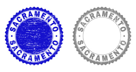Obraz premium Grunge SACRAMENTO watermarks isolated on a white background. Rosette seals with grunge texture in blue and gray colors. Vector rubber overlay of SACRAMENTO text inside round rosette.