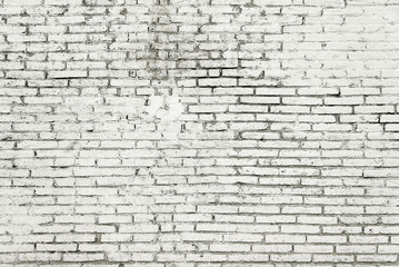 Fototapeta na wymiar Old brick wall with white paint background texture