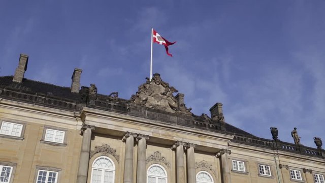 Flag on Amalienborg Palace in Copenhagen