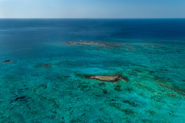 Obraz premium Greece island by drone. Turquoise sea and lagoon. Sunny day on Crete.