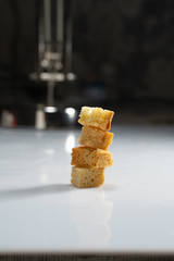 a stack of bread crackers on a white table