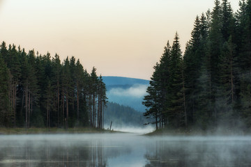 Impressively beautiful Fairy-tale mountain lake with crystal clear water Breathtaking Scene. 