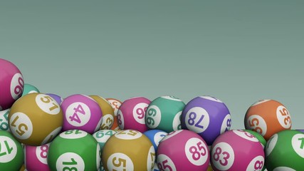 coloured lotto balls rolling, two versions: the first with light background and the second with black background, copy space (3d render)